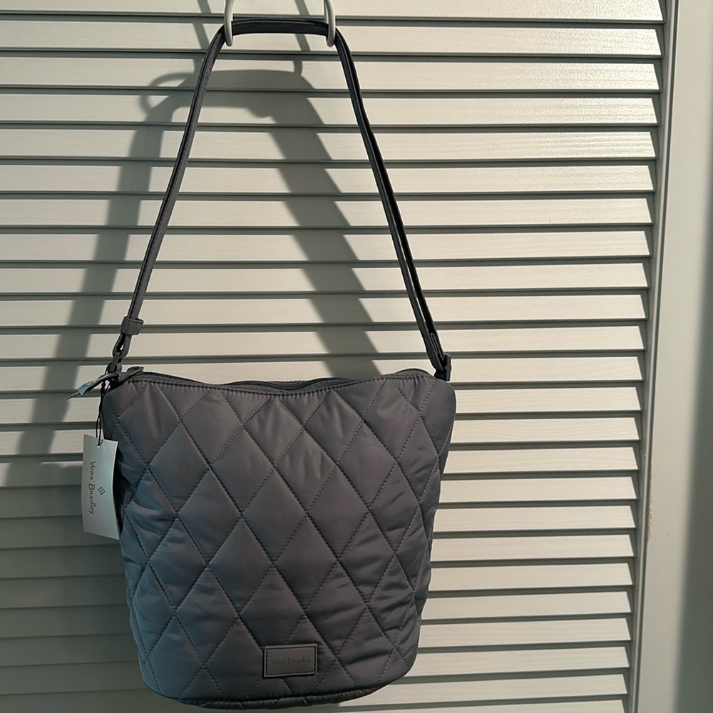 NWT Vera Bradley Quilted Gray Bucket Crossbody Bag with expandable strap.